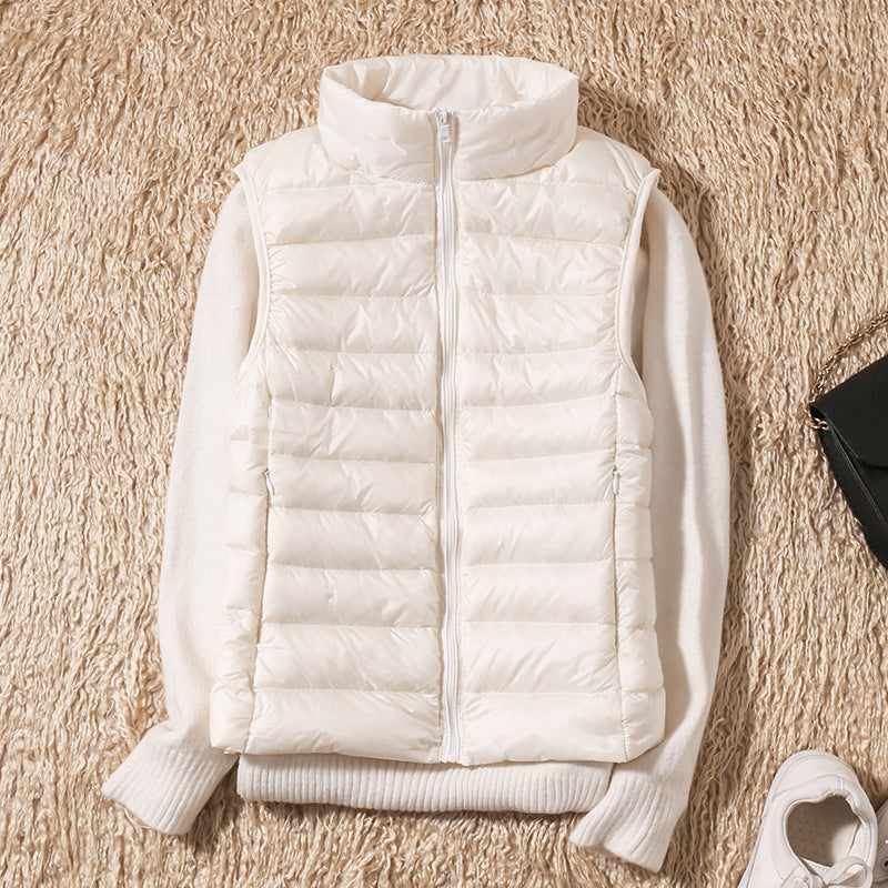 Amira™ | Lightweight down vest with pleated design